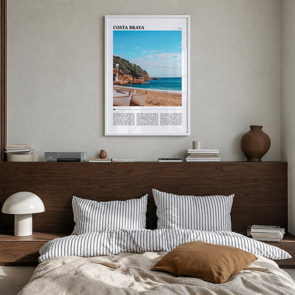 Costa Brava no. 2 colorful travel poster of Spain – vertical wall art in white wood frame, hanging on wall