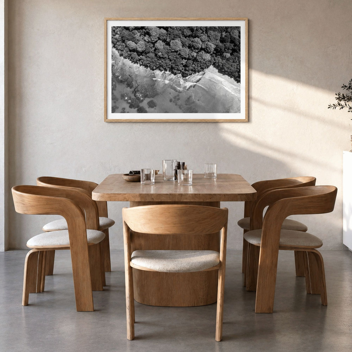 Costa Rica Photo Poster in a natural wood frame, hanging in a dining room, white border