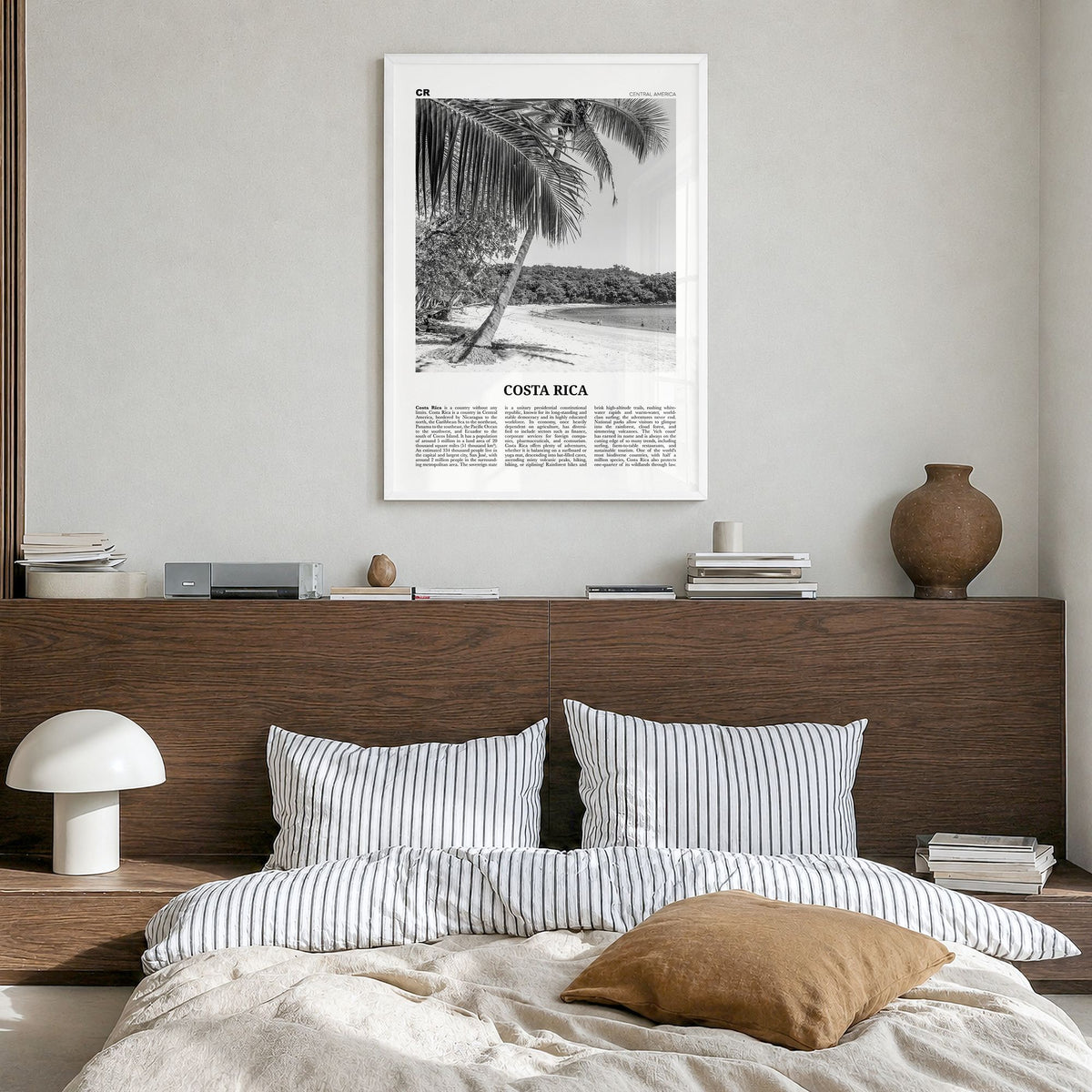 Costa Rica Newspaper No 2 Poster in a white wood frame, hanging in a bedroom
