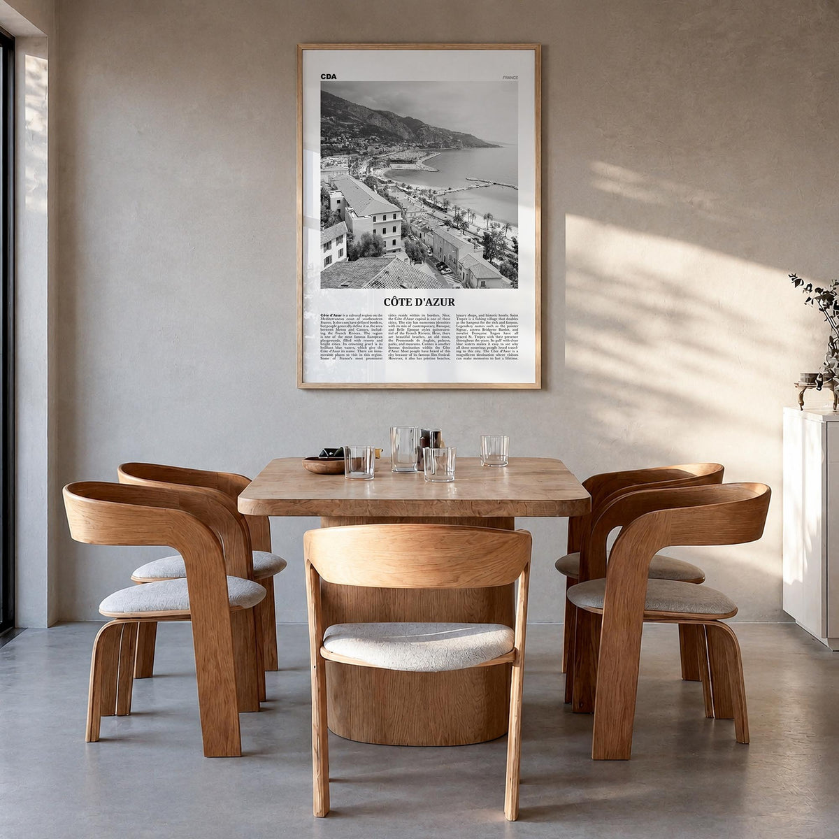 Côte d'Azur black & white newspaper poster of France – vertical wall art in natural wood frame, hanging on wall