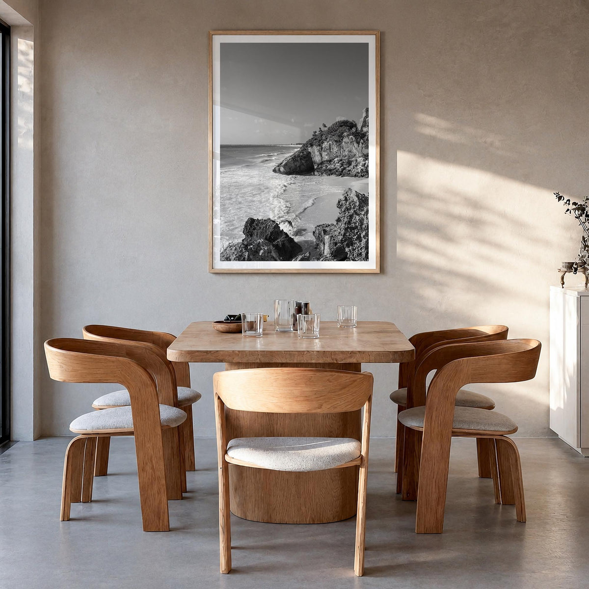 Cozumel black & white photo poster of Mexico – vertical wall art in natural wood frame with white border, hanging on wall