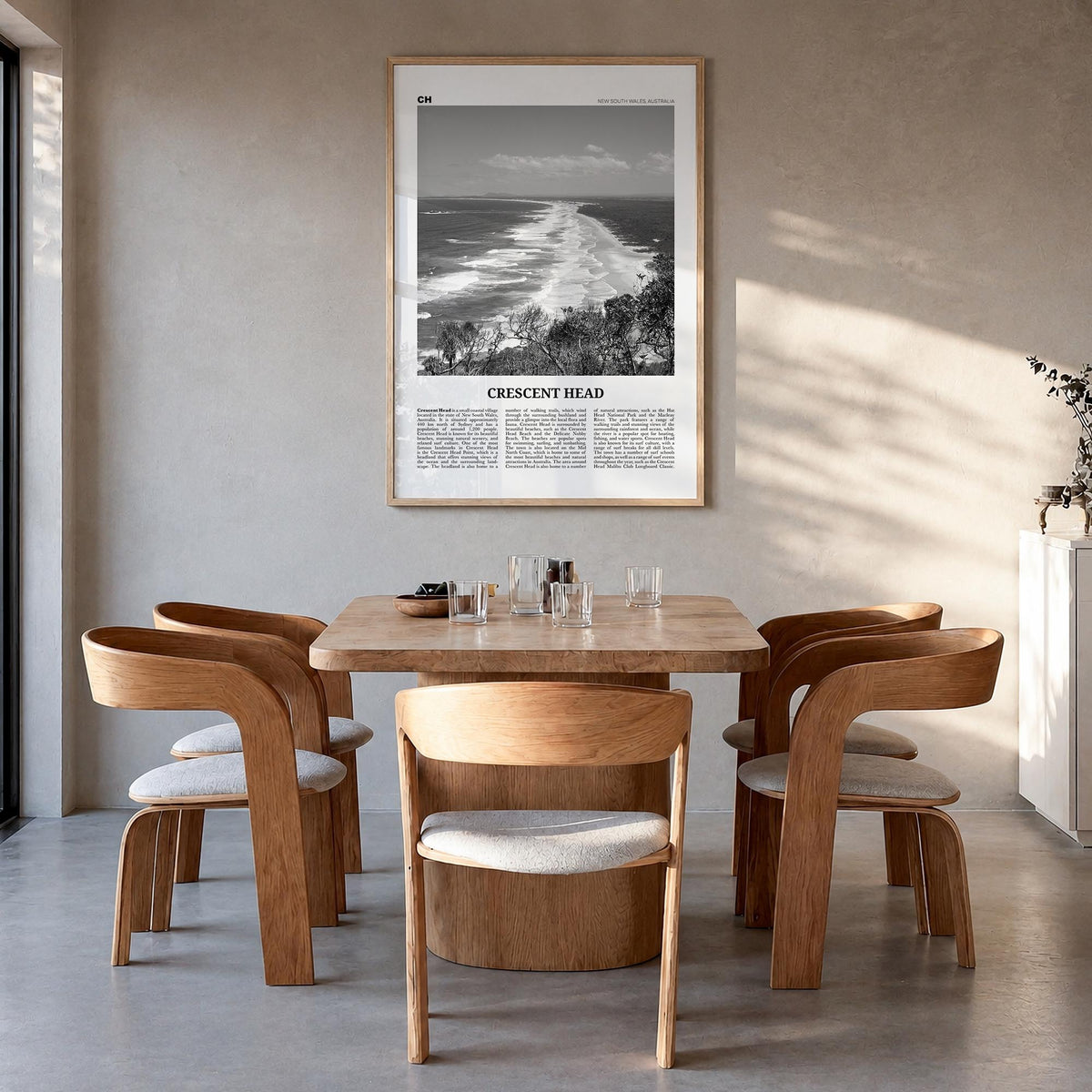 Crescent Head black & white newspaper poster of Australia – vertical wall art in natural wood frame, hanging on wall