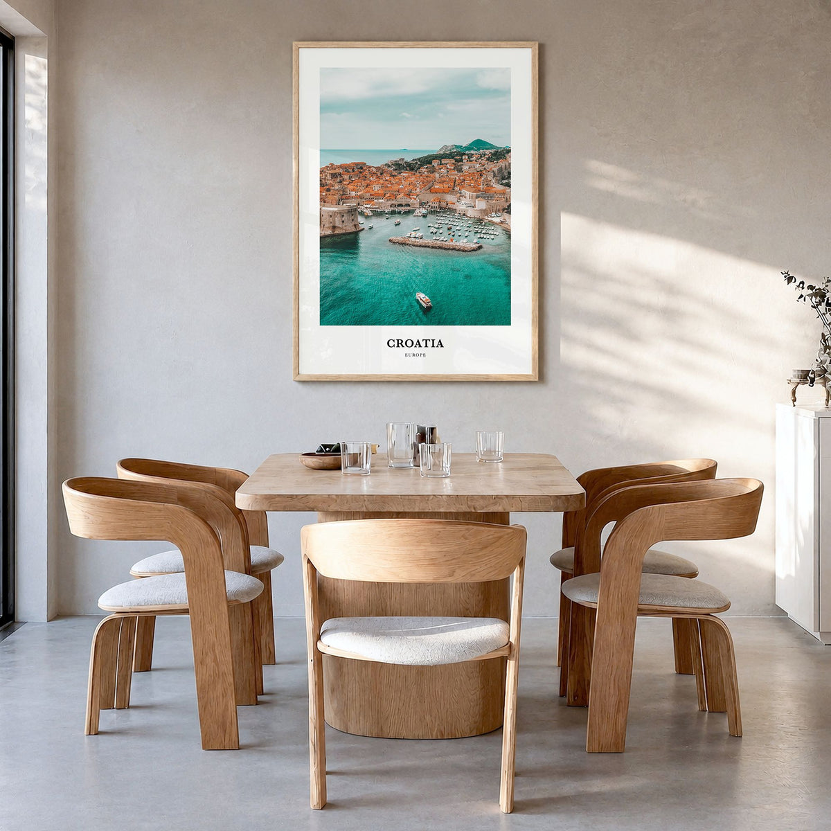 Croatia Classic Poster in a natural wood frame, hanging in a dining room