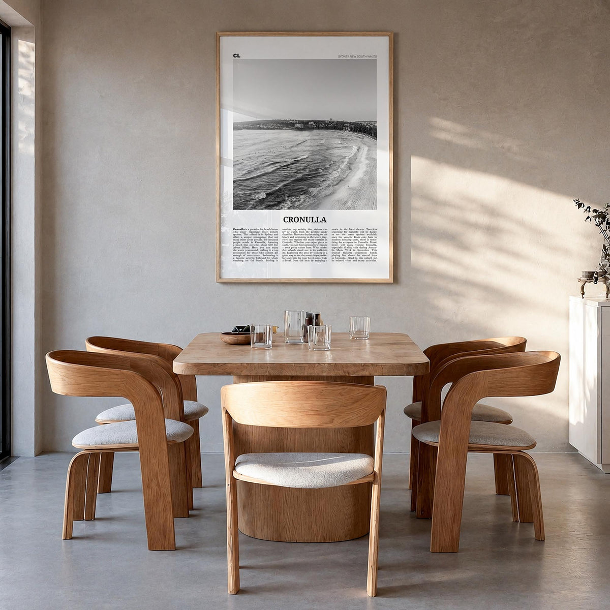 Cronulla black & white newspaper poster of Australia – vertical wall art in natural wood frame, hanging on wall