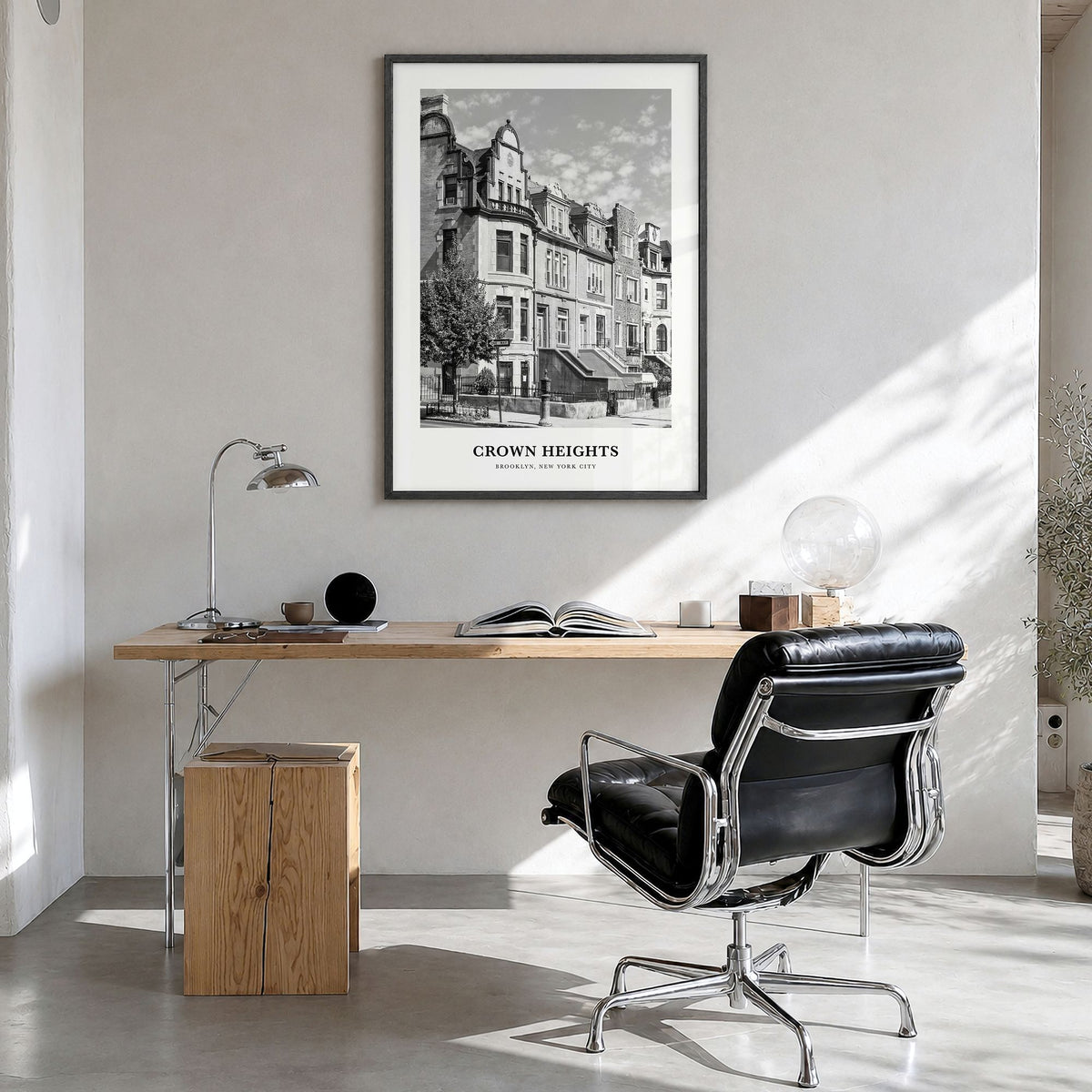 Crown Heights Classic Poster in a black wood frame, hanging in a bright home office