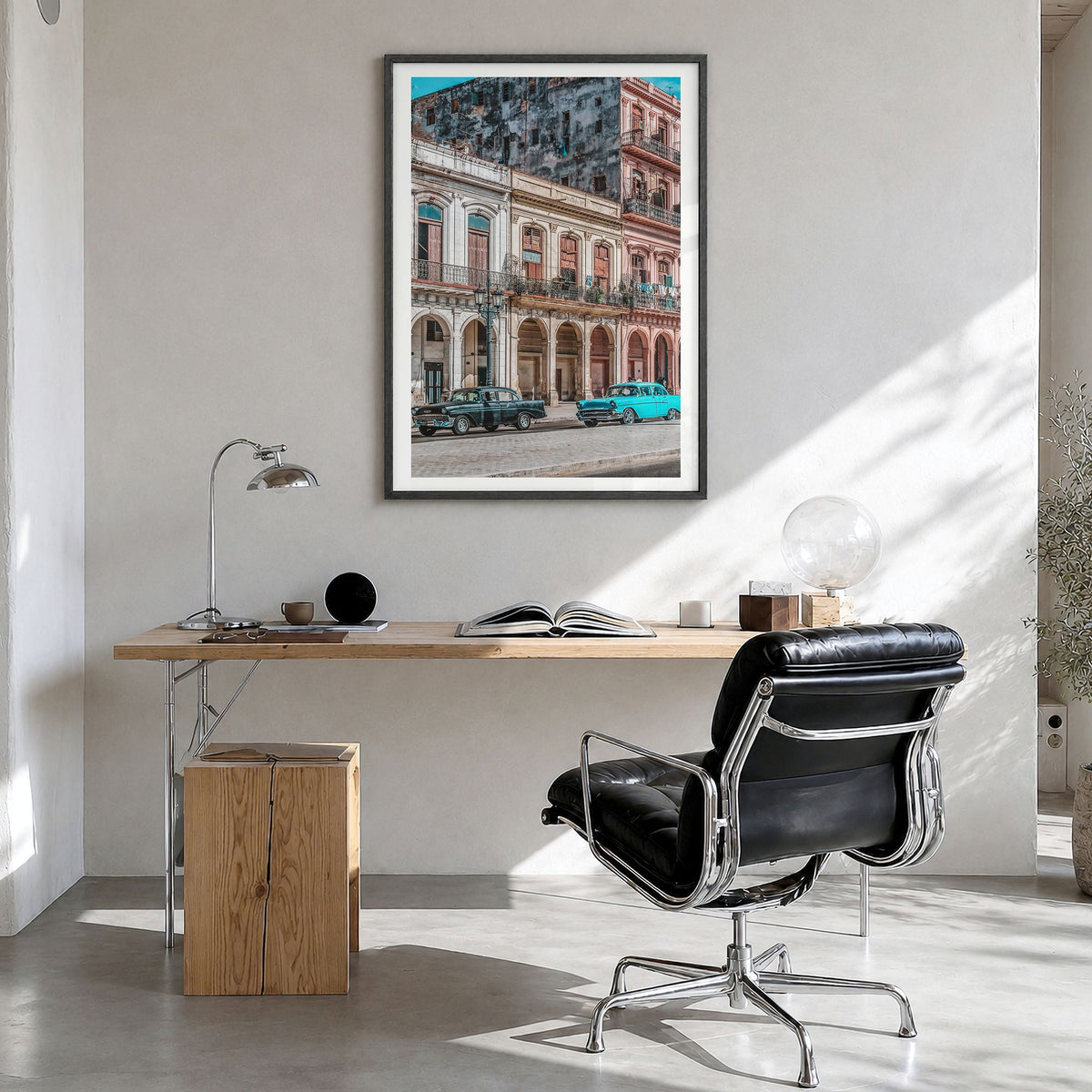 Cuba Photo Poster in a black wood frame, hanging in a bright home office, white border