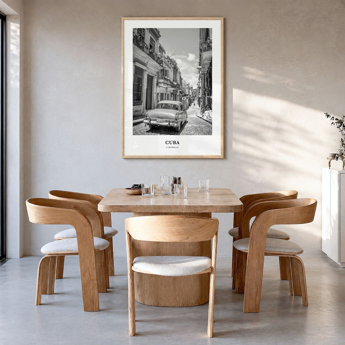Cuba Classic No 2 Poster in a natural wood frame, hanging in a dining room