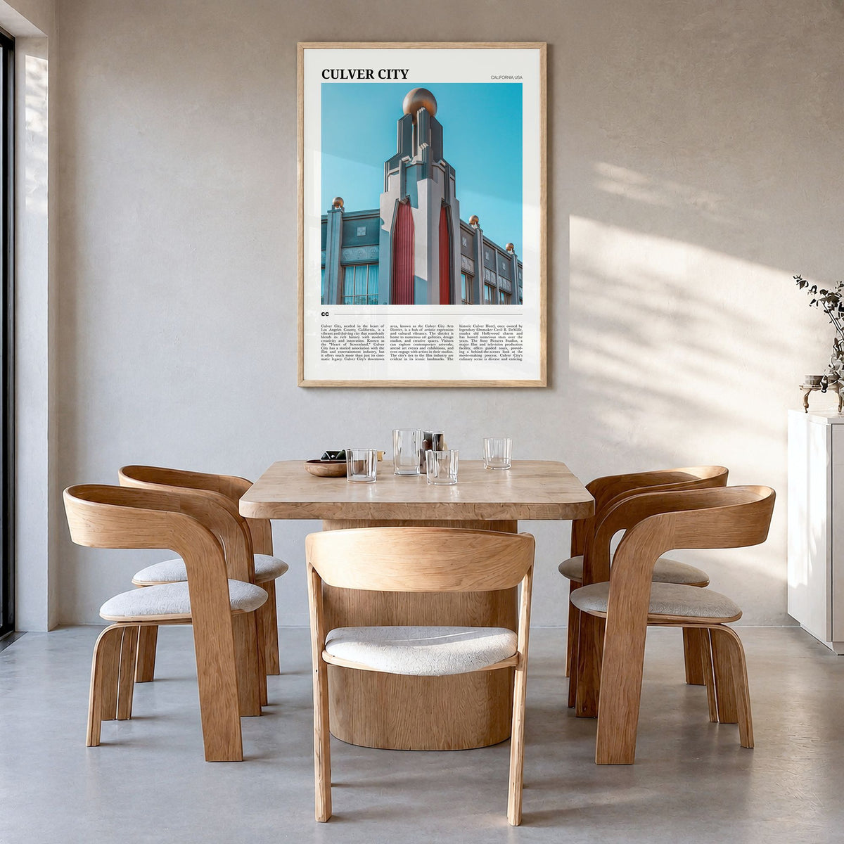 Culver City Travel Poster in a natural wood frame, hanging in a dining room