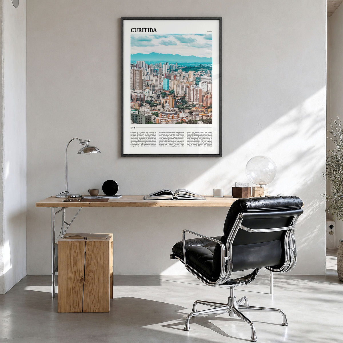 Curitiba Travel Poster in a black wood frame, hanging in a bright home office