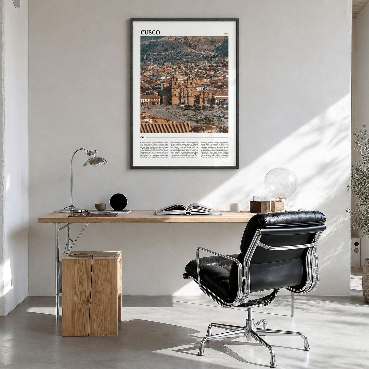Cusco Travel Poster in a black wood frame, hanging in a bright home office