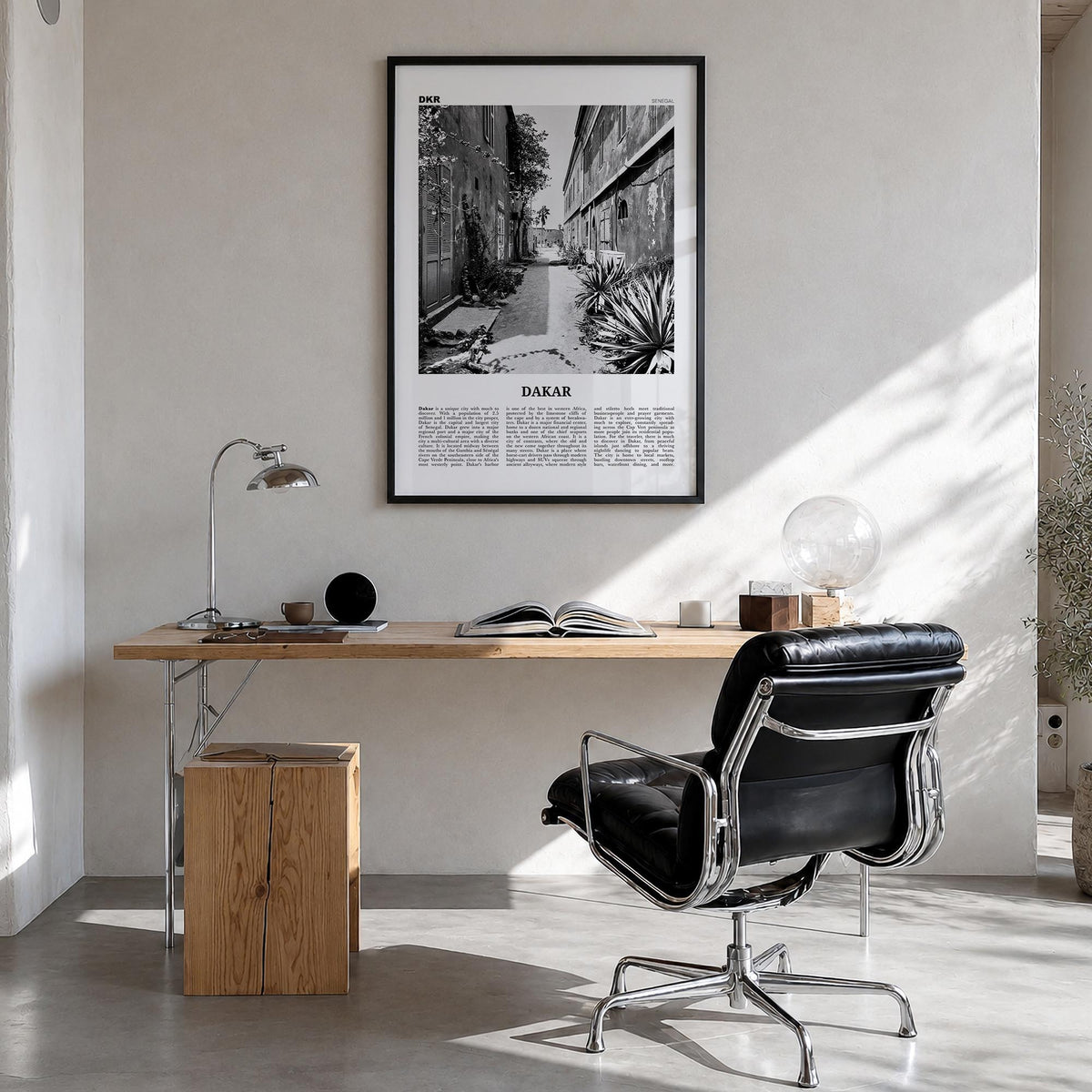 Dakar no. 1 black & white newspaper poster of Senegal – vertical wall art in black wood frame, hanging on wall