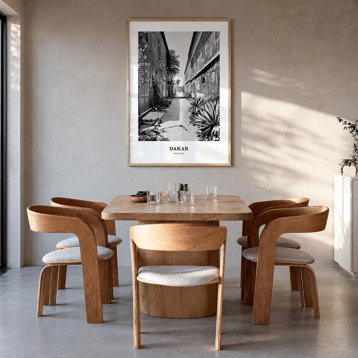 Dakar no. 2 black & white classic poster of Senegal – vertical wall art in natural wood frame, hanging on wall