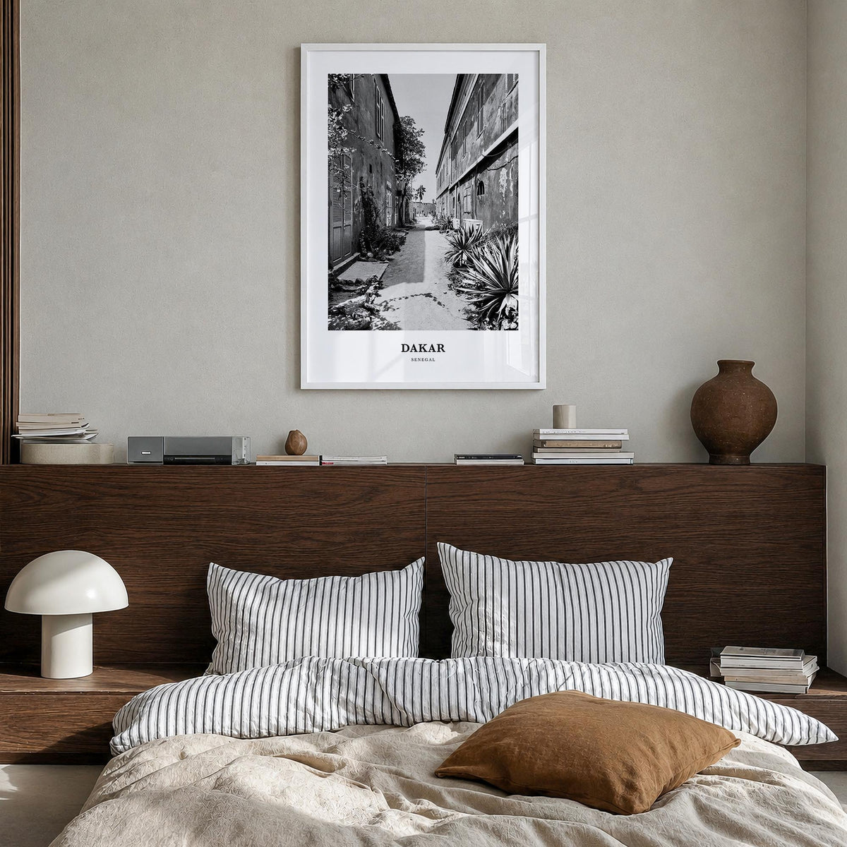 Dakar no. 2 black & white classic poster of Senegal – vertical wall art in white wood frame, hanging on wall
