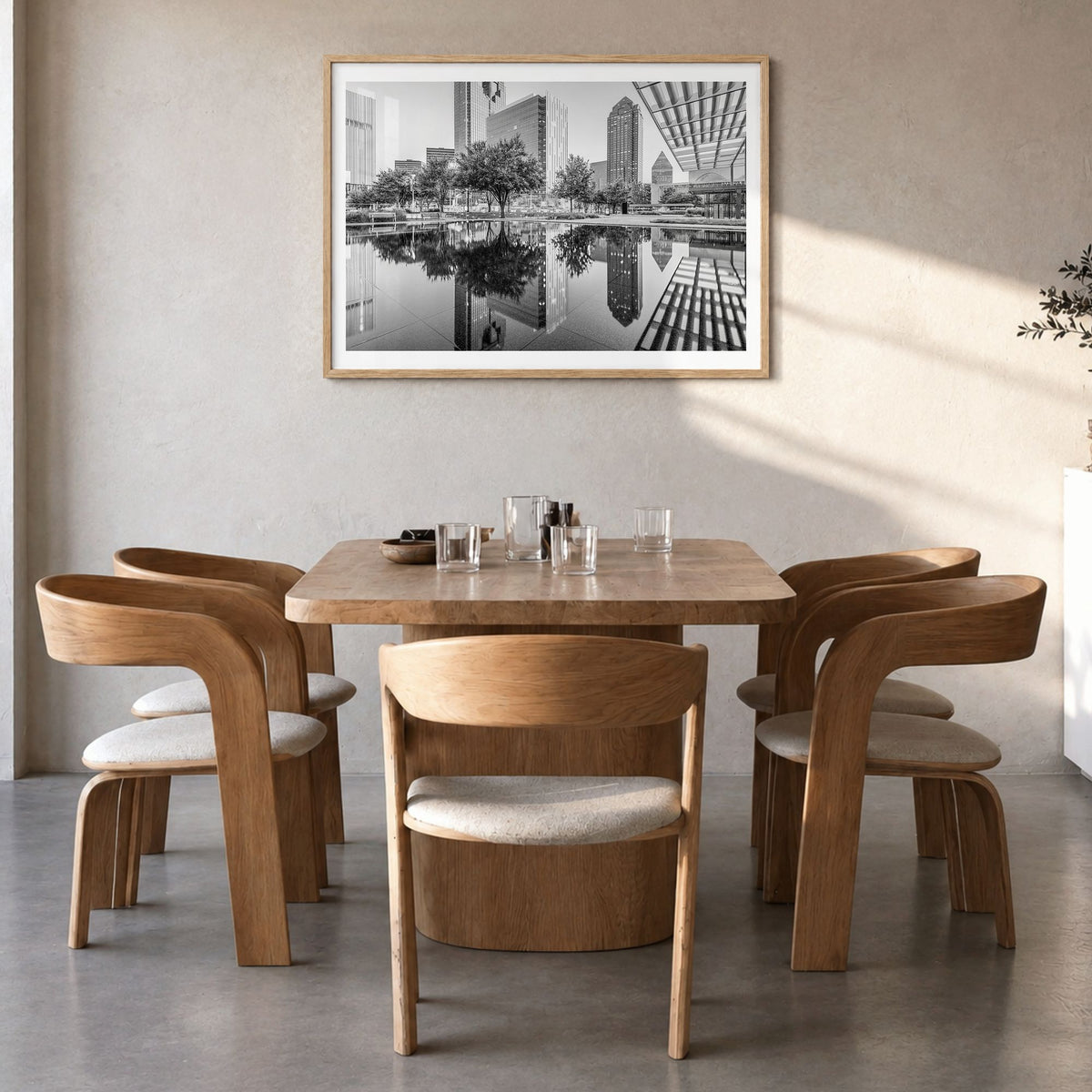 Dallas Photo Poster in a natural wood frame, hanging in a dining room, white border