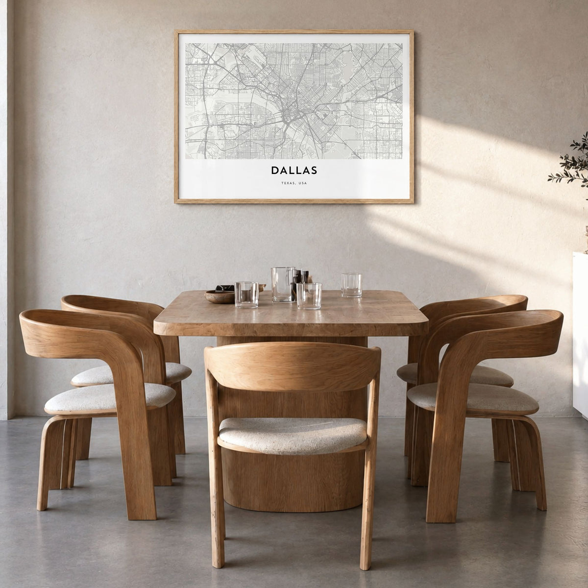 Dallas Map Poster in a natural wood frame, hanging in a dining room