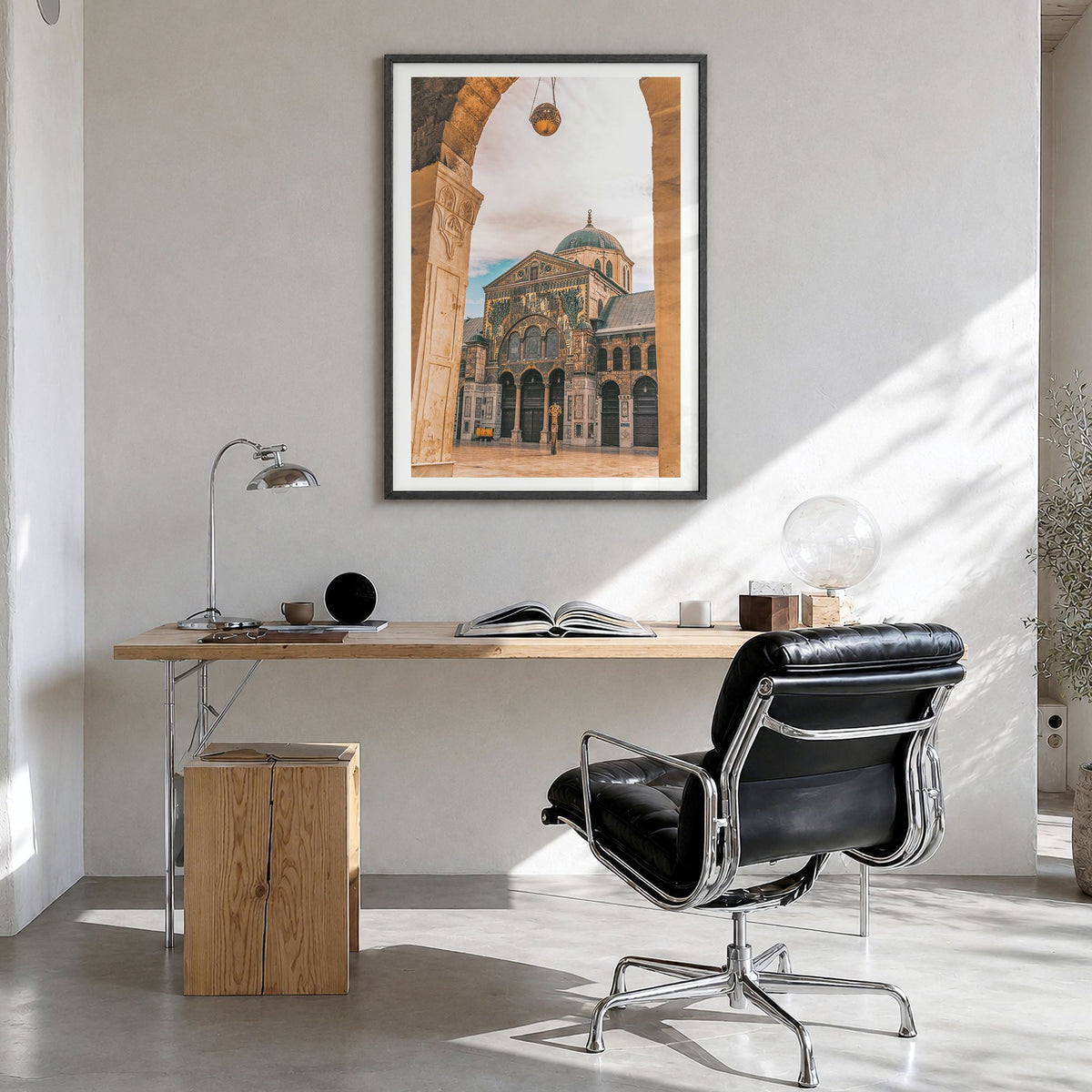Damascus Photo Poster in a black wood frame, hanging in a bright home office, white border