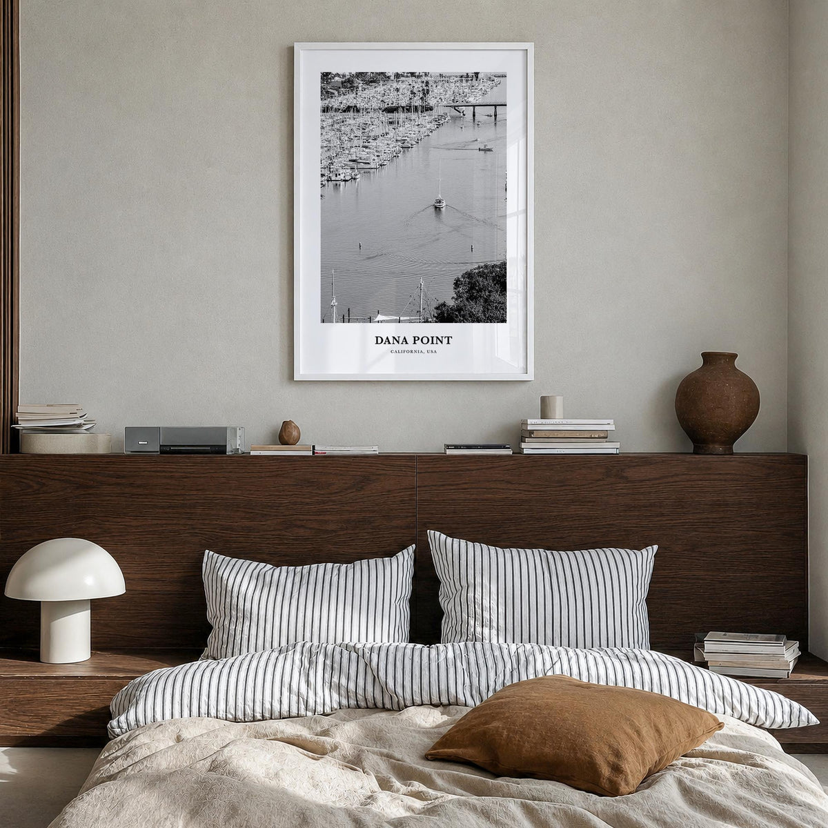 Dana Point black & white classic poster of California, USA – vertical wall art in white wood frame, hanging on wall