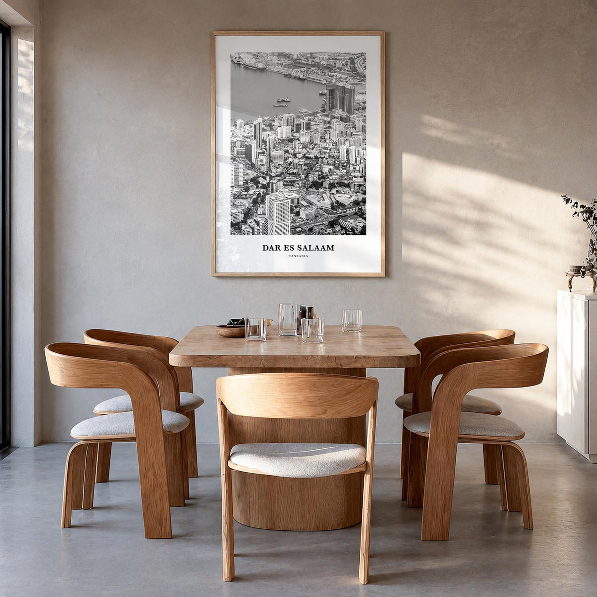 Dar es Salaam black & white classic poster of Tanzania – vertical wall art in natural wood frame, hanging on wall