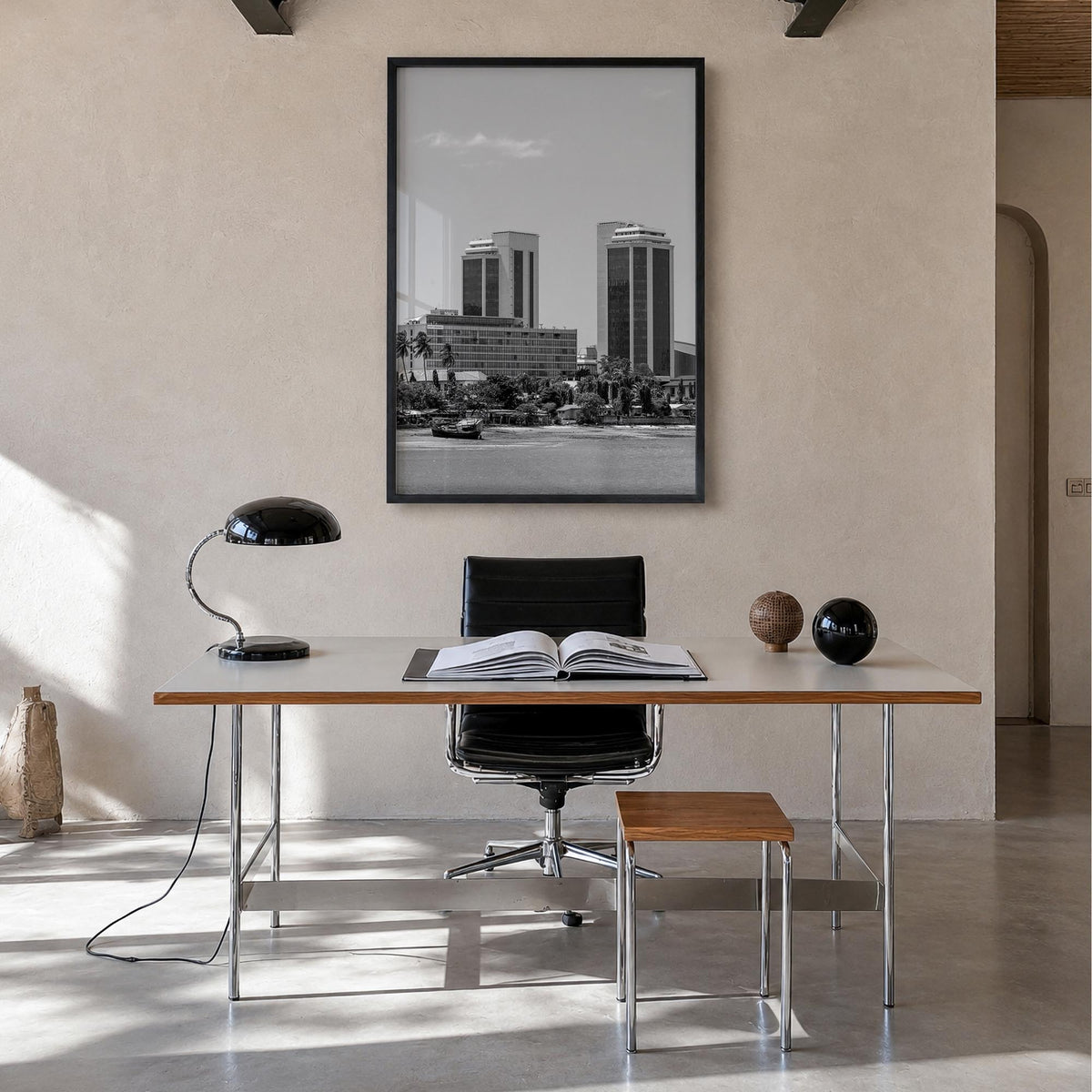 Dar es Salaam black & white photo poster of Tanzania – vertical wall art in black wood frame, hanging on wall