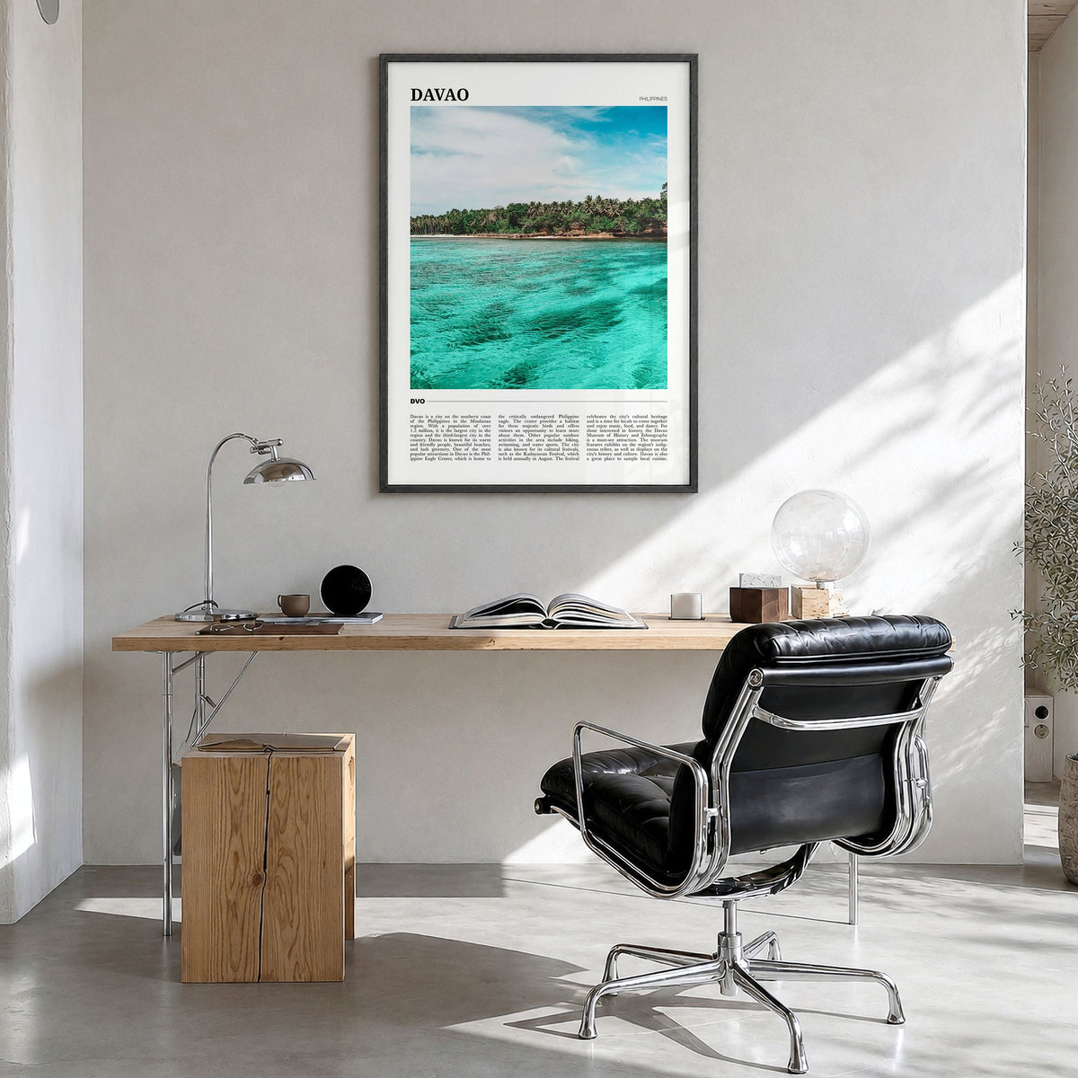 Davao Travel Poster in a black wood frame, hanging in a bright home office