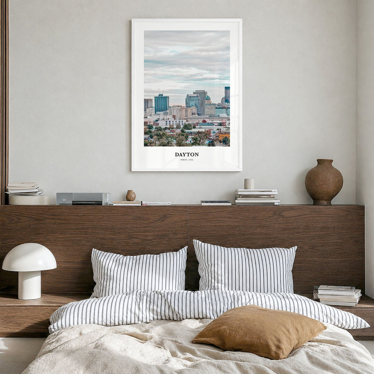 Dayton Classic Poster in a white wood frame, hanging in a bedroom