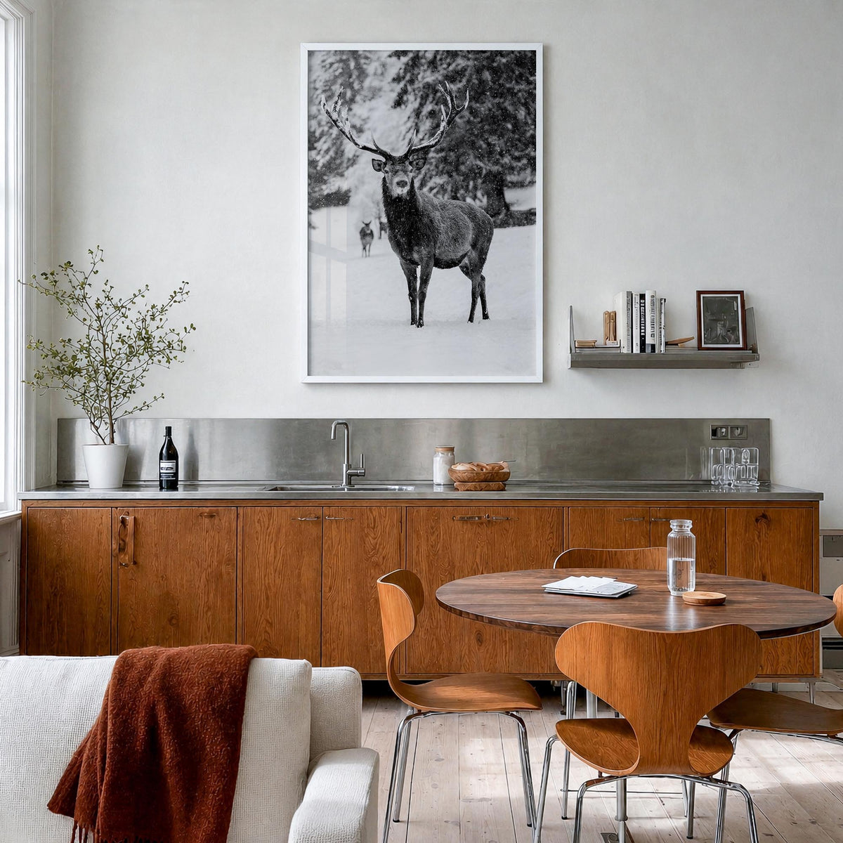 Deer black & white photo poster – vertical wall art in white wood frame, hanging on wall