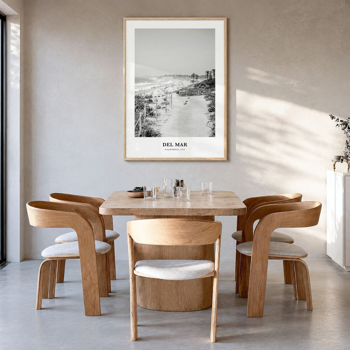 Del Mar Classic No 1 Poster in a natural wood frame, hanging in a dining room