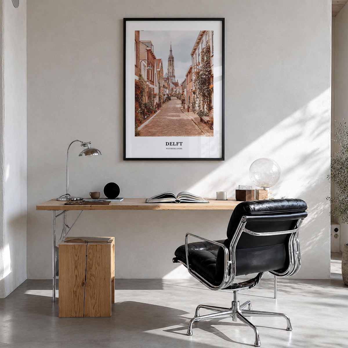 Delft colorful classic poster of Netherlands – vertical wall art in black wood frame, hanging on wall