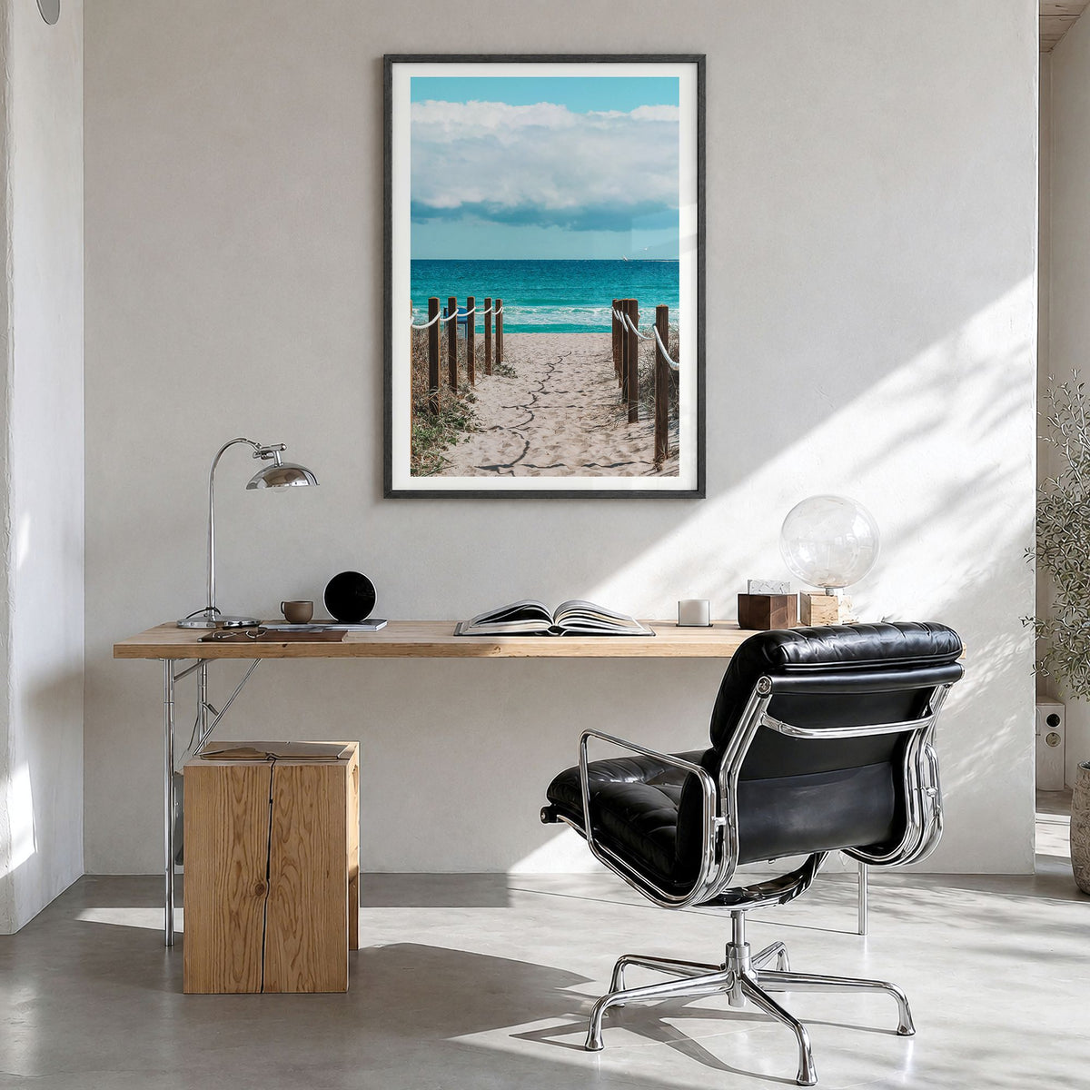 Delray Beach Photo Poster in a black wood frame, hanging in a bright home office, white border
