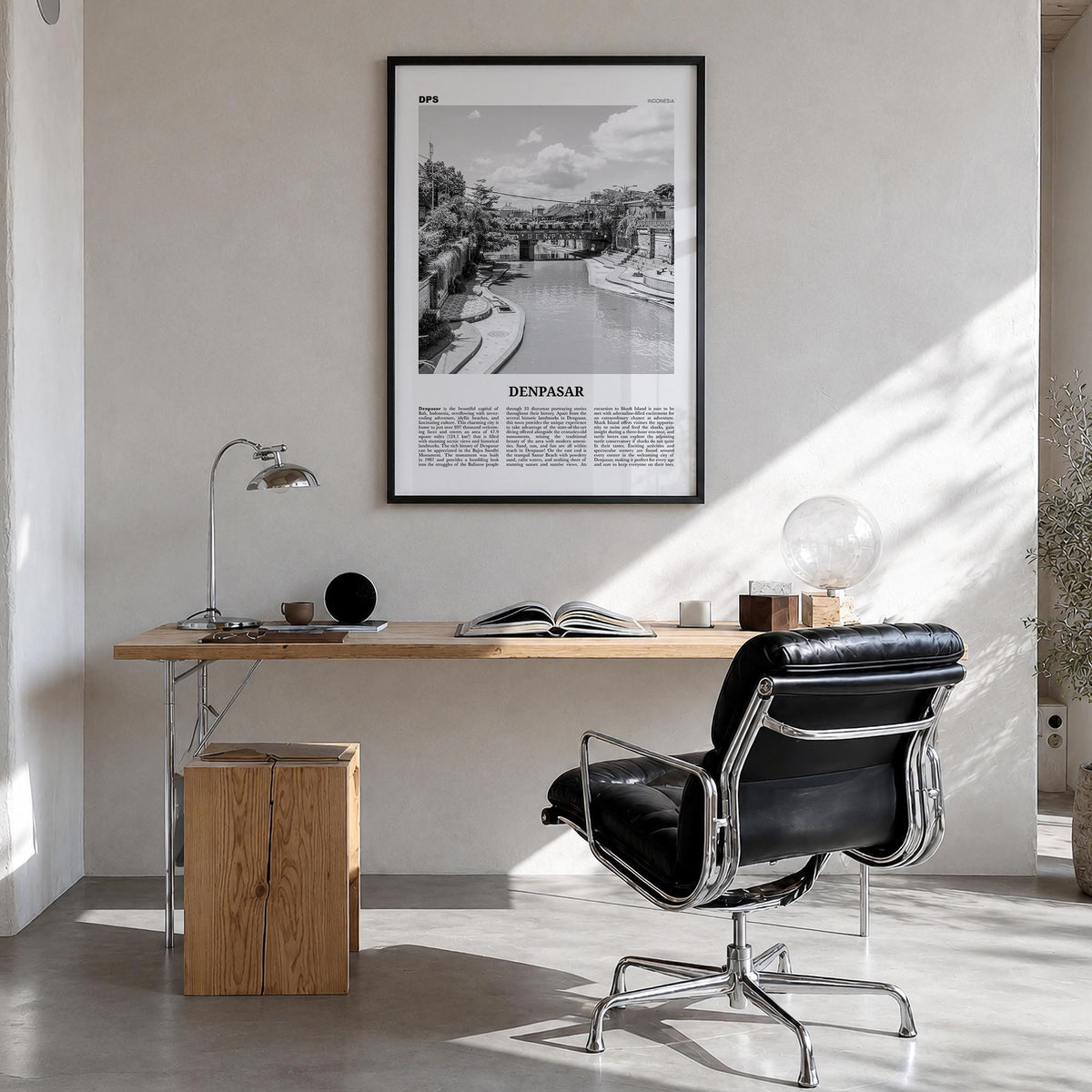Denpasar black & white newspaper poster of Indonesia – vertical wall art in black wood frame, hanging on wall