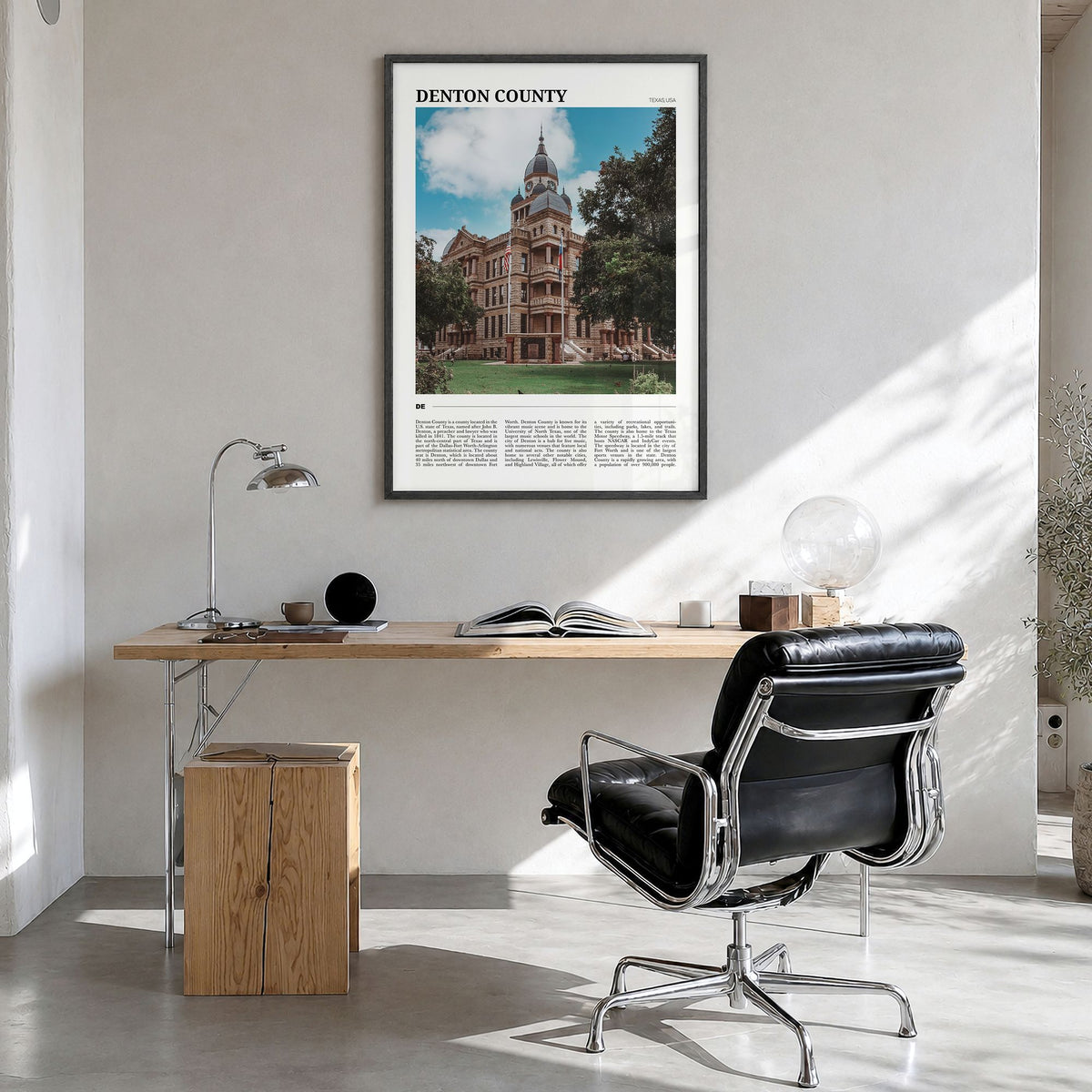 Denton County Travel Poster in a black wood frame, hanging in a bright home office