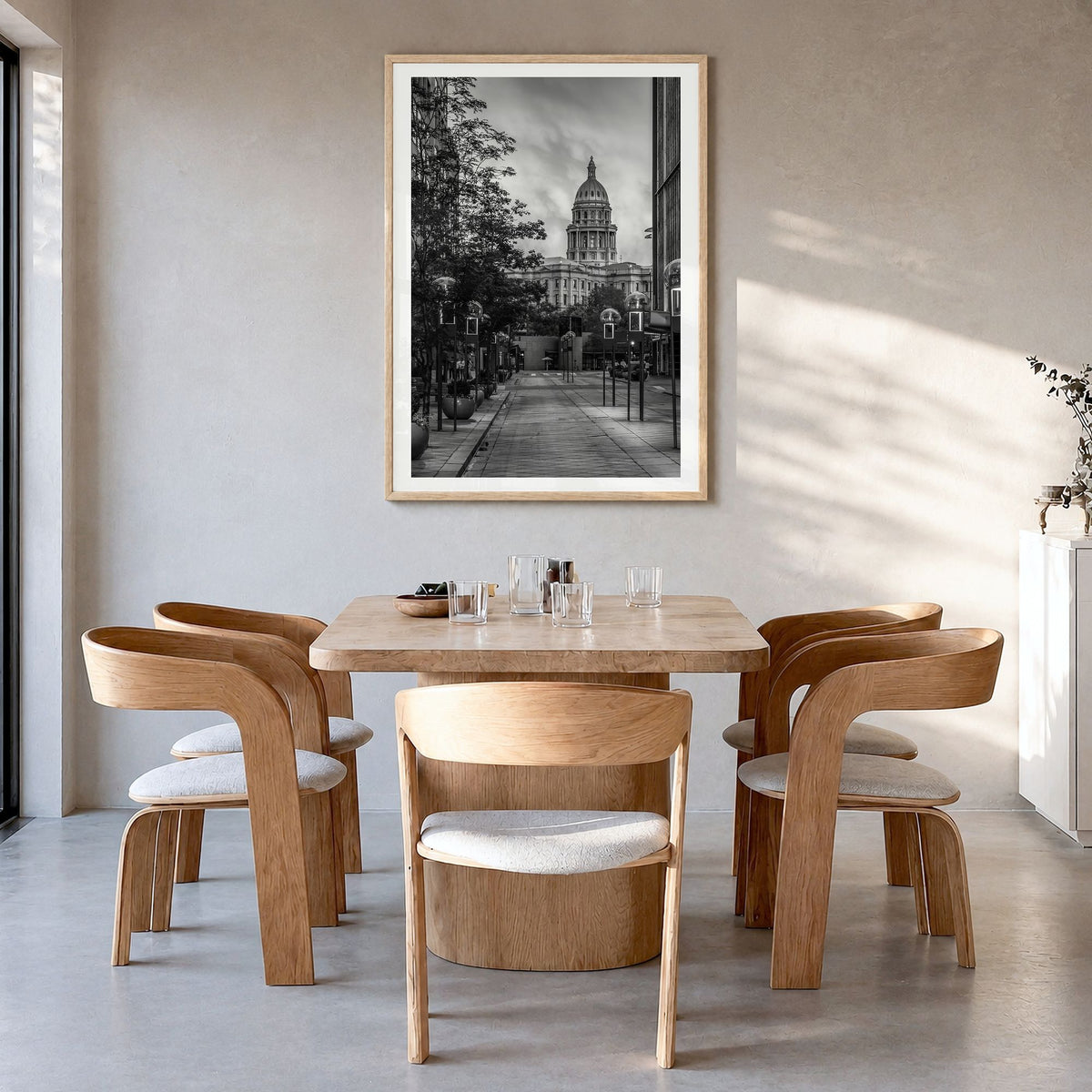 Denver Photo No 3 Poster in a natural wood frame, hanging in a dining room, white border
