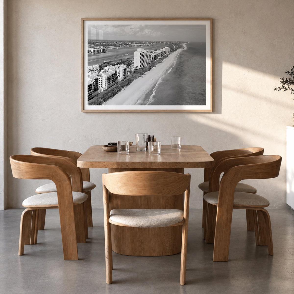 Destin black & white photo poster of Florida, USA – horizontal wall art in natural wood frame with white border, hanging on w