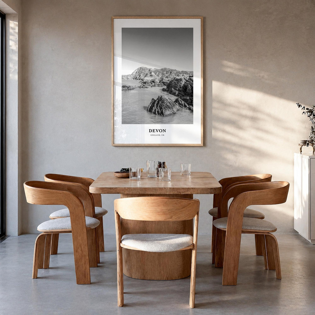 Devon black & white classic poster of England, UK – vertical wall art in natural wood frame, hanging on wall