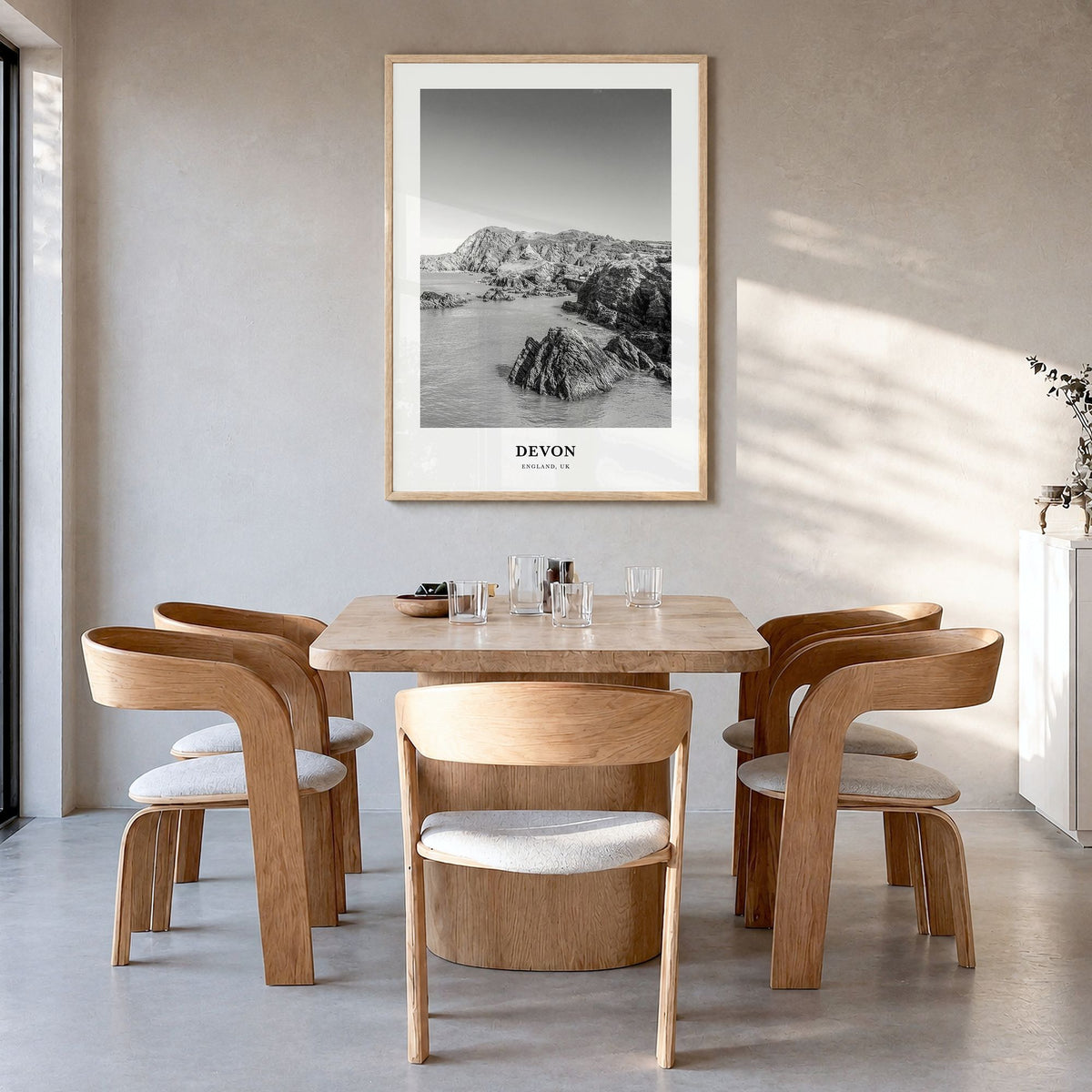 Devon Classic Poster in a natural wood frame, hanging in a dining room