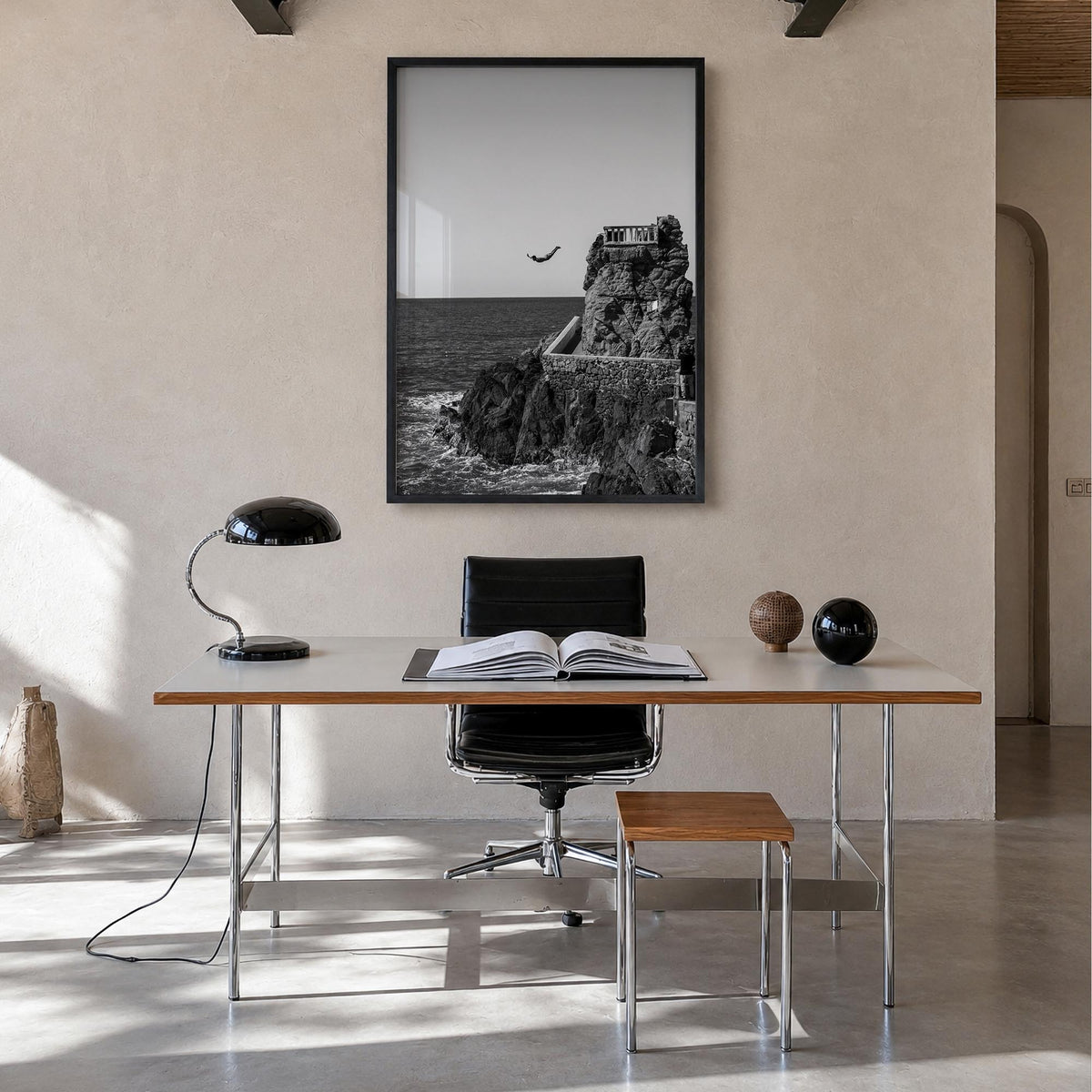 Diving black & white photo poster – vertical wall art in black wood frame, hanging on wall