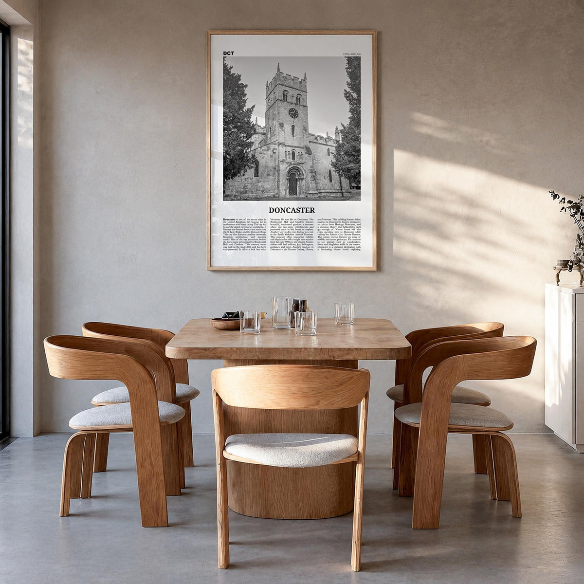 Doncaster black & white newspaper poster of United Kingdom – vertical wall art in natural wood frame, hanging on wall