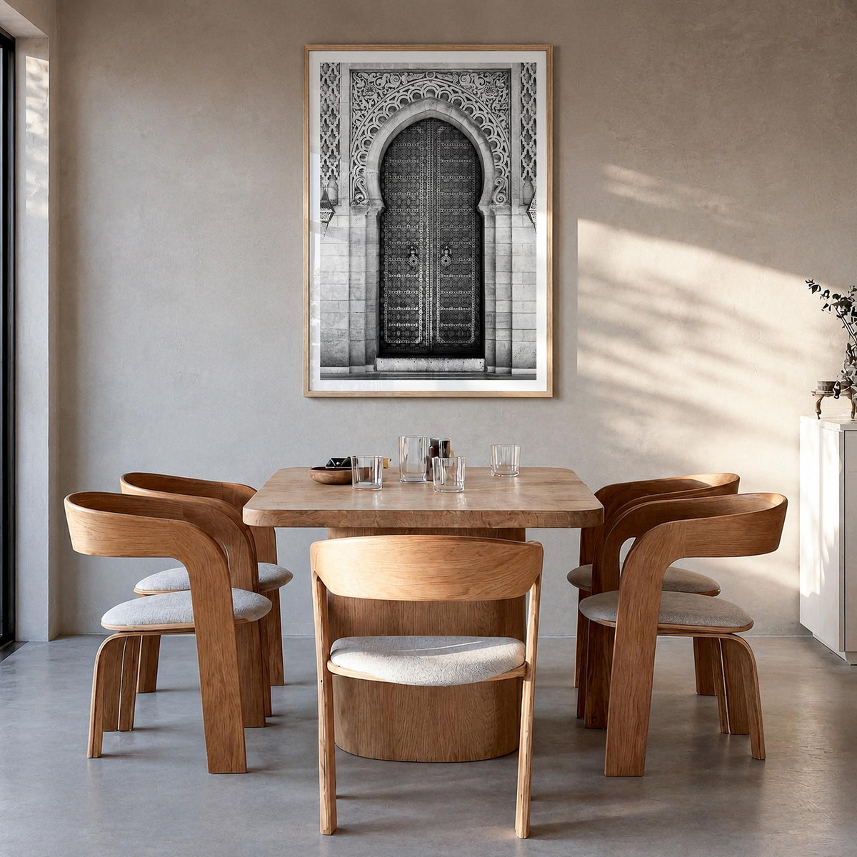 Door black & white photo poster – vertical wall art in natural wood frame with white border, hanging on wall