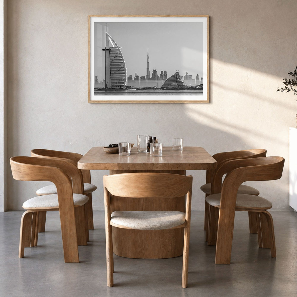 Dubai Photo Poster in a natural wood frame, hanging in a dining room, white border