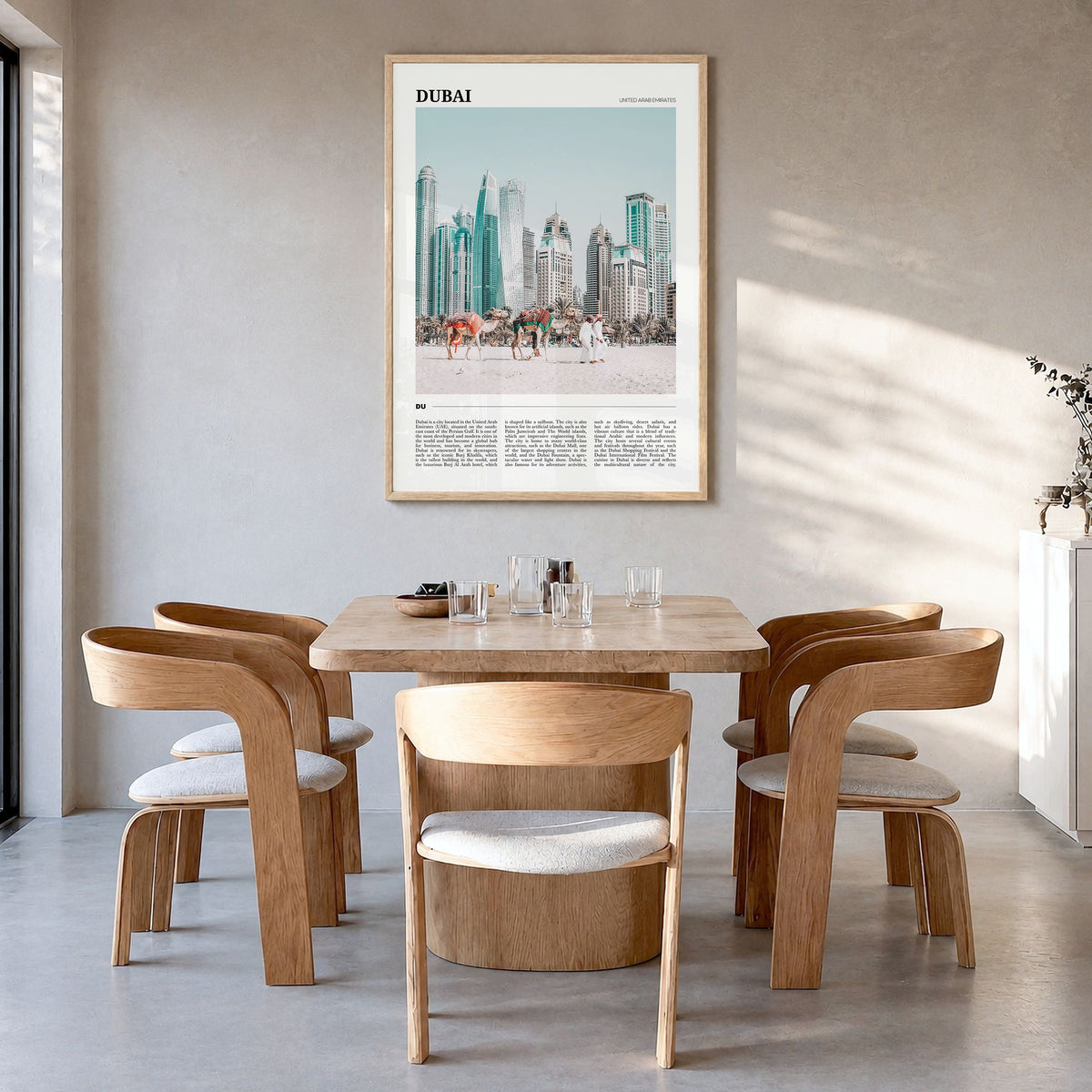 Dubai Travel Poster in a natural wood frame, hanging in a dining room