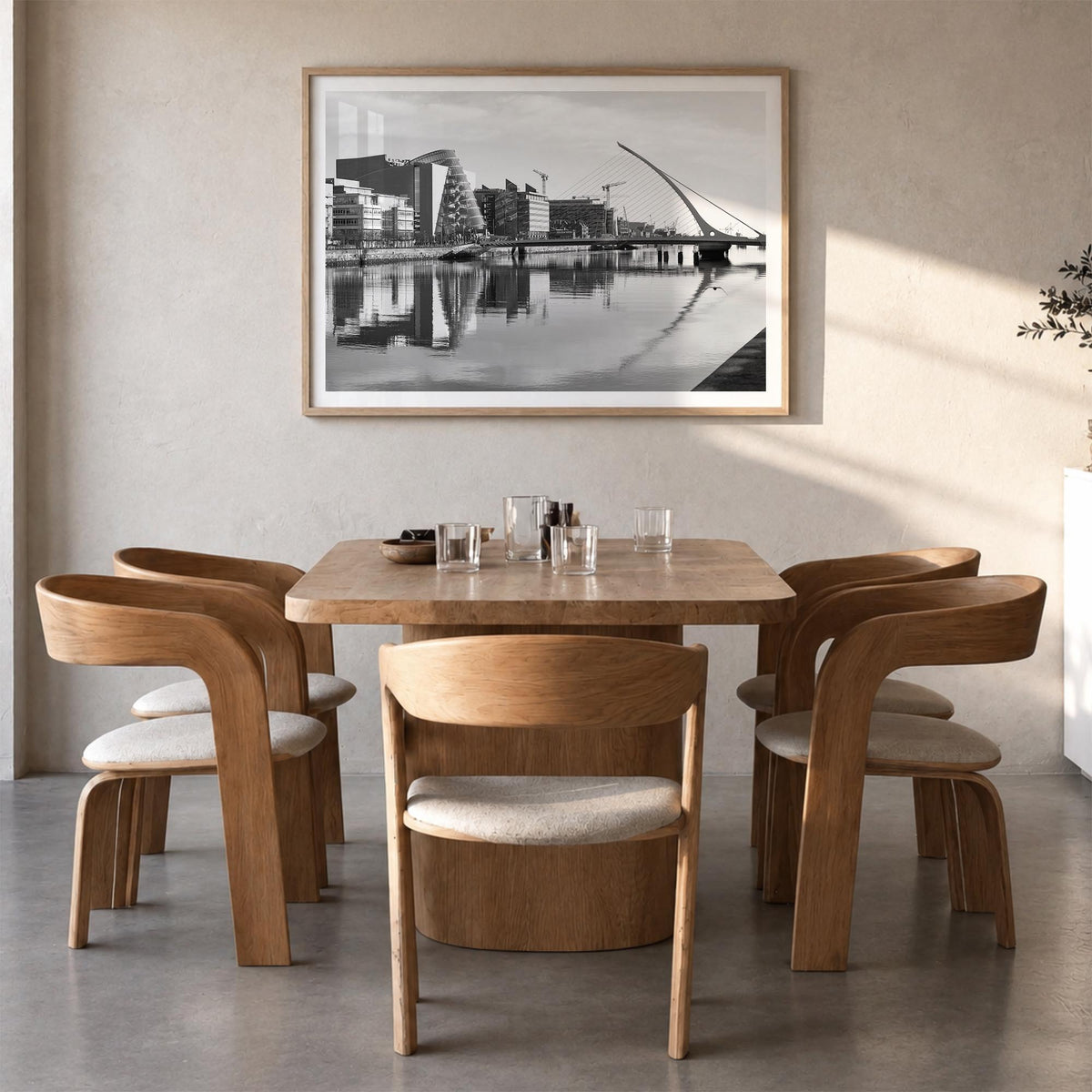 Dublin black & white photo poster of Ireland – horizontal wall art in natural wood frame with white border, hanging on wall
