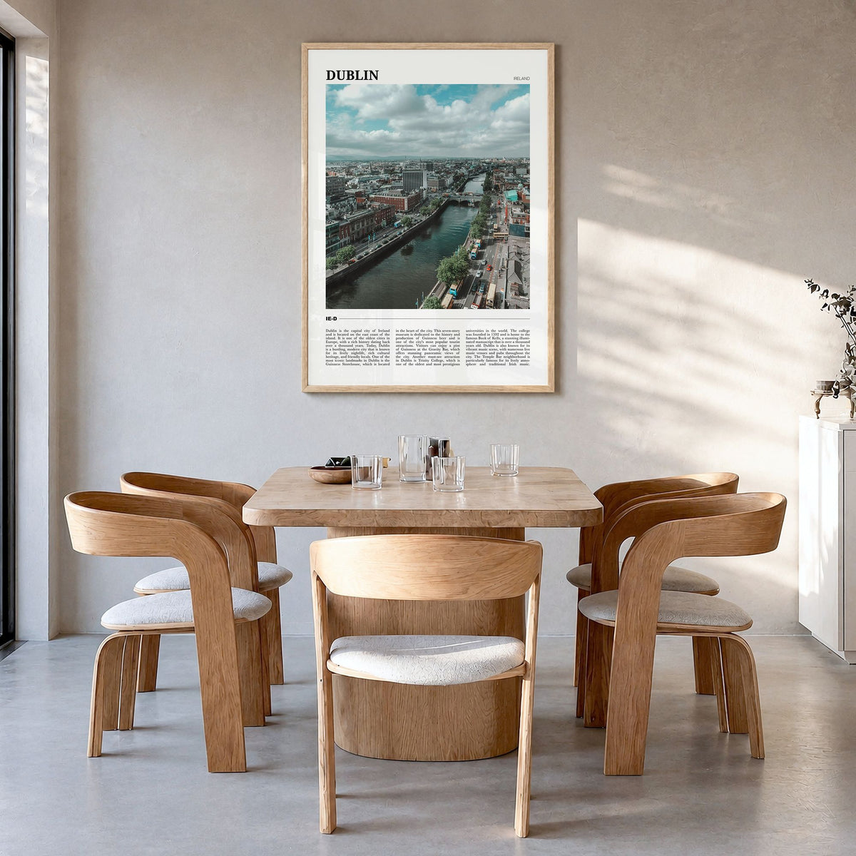 Dublin Travel Poster in a natural wood frame, hanging in a dining room