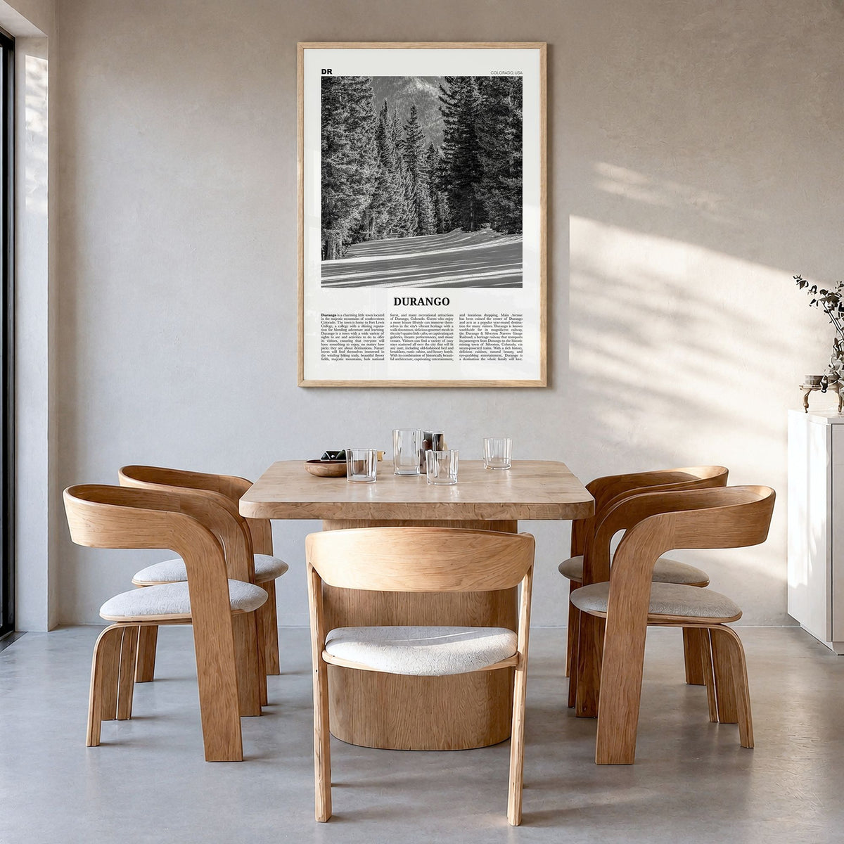 Durango, Colorado Newspaper Poster in a natural wood frame, hanging in a dining room