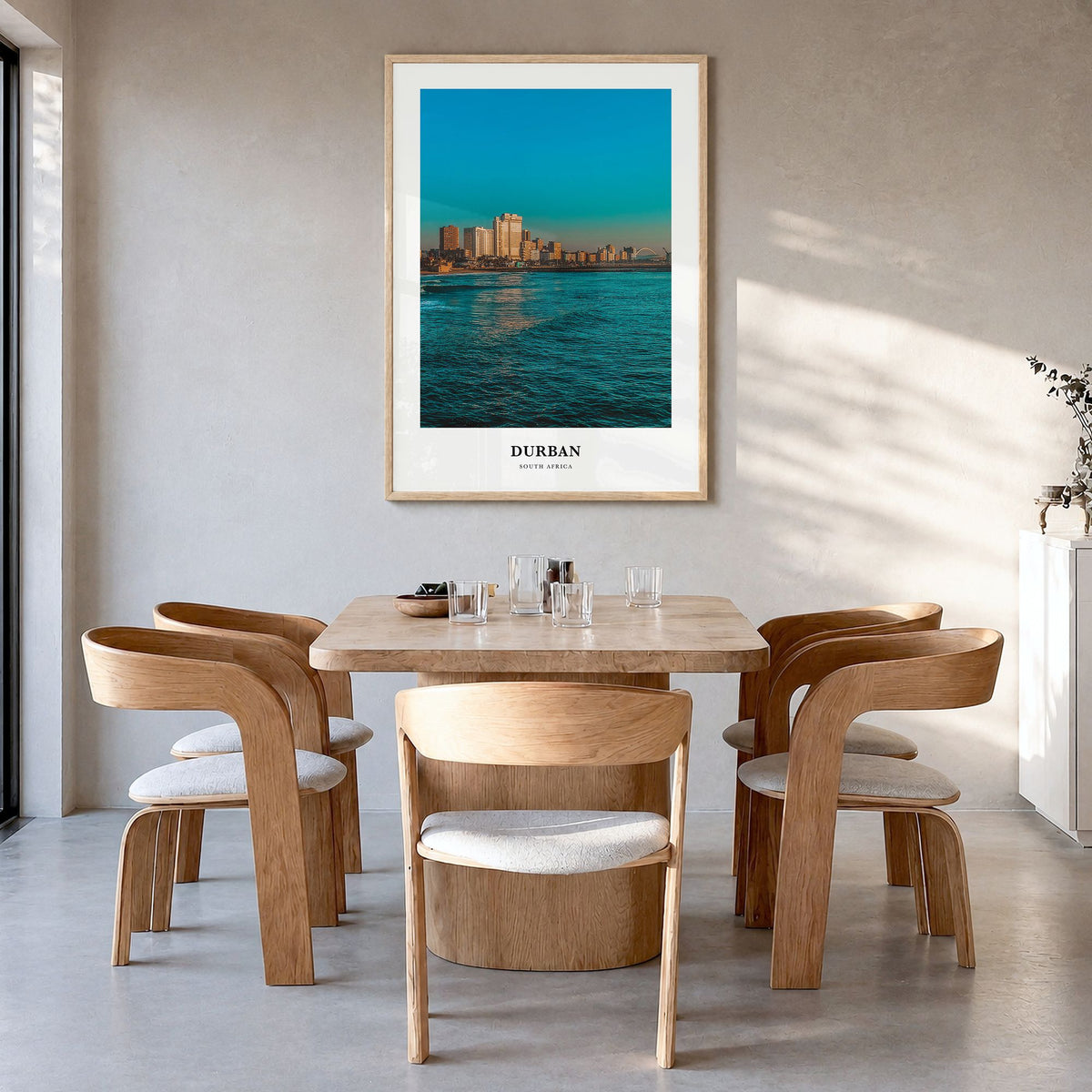 Durban Classic Poster in a natural wood frame, hanging in a dining room