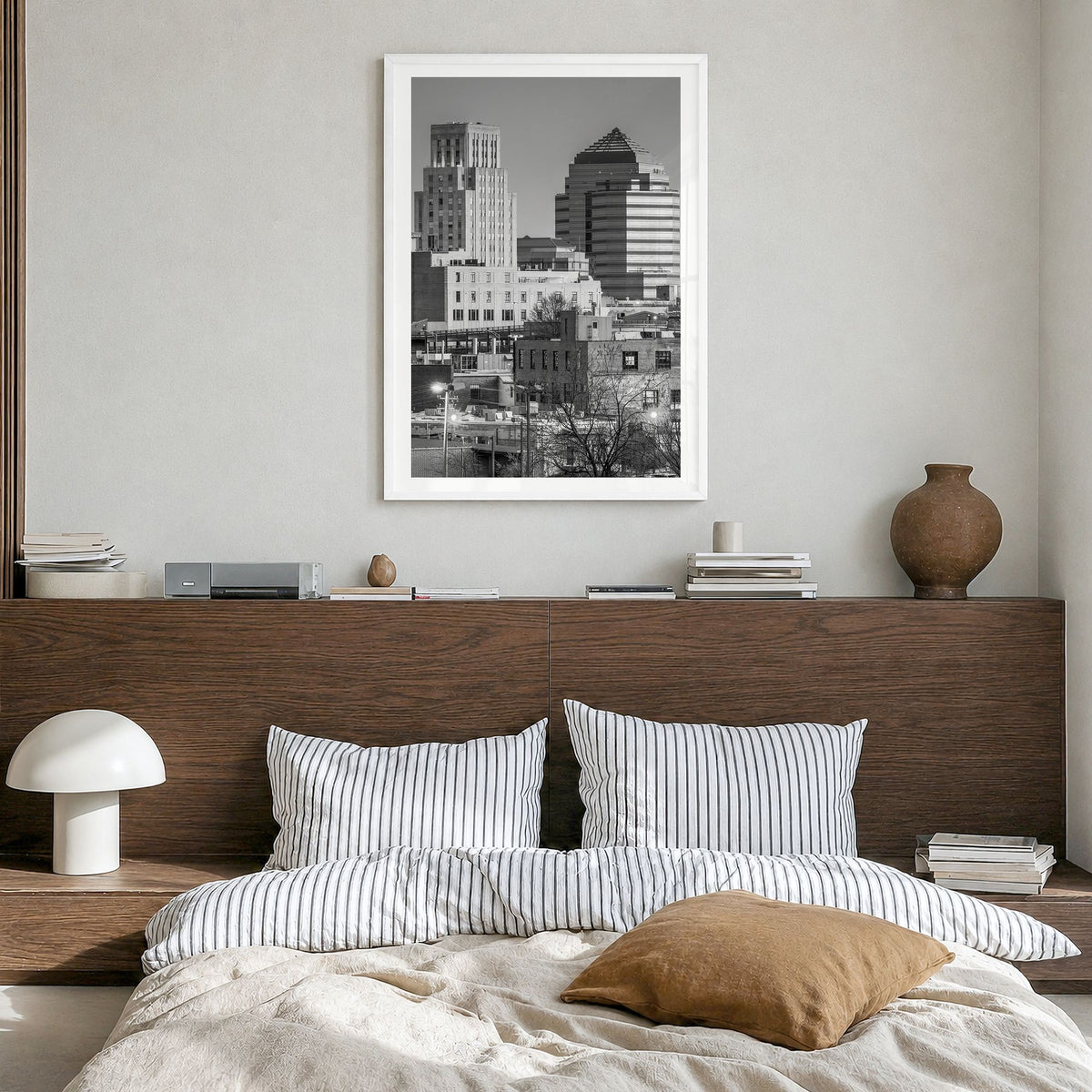 Durham, North Carolina Photo Poster in a white wood frame, hanging in a bedroom, white border