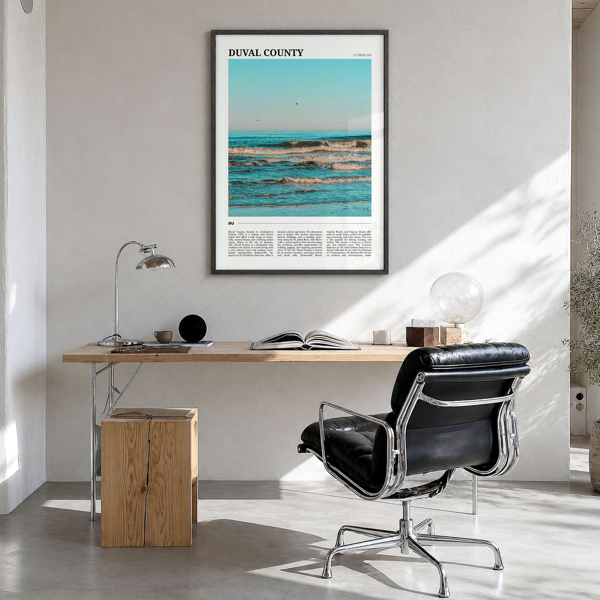 Duval County Travel Poster in a black wood frame, hanging in a bright home office