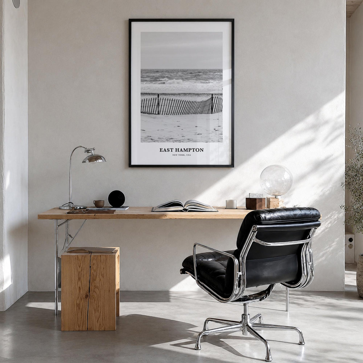 East Hampton black & white classic poster of New York, USA – vertical wall art in black wood frame, hanging on wall