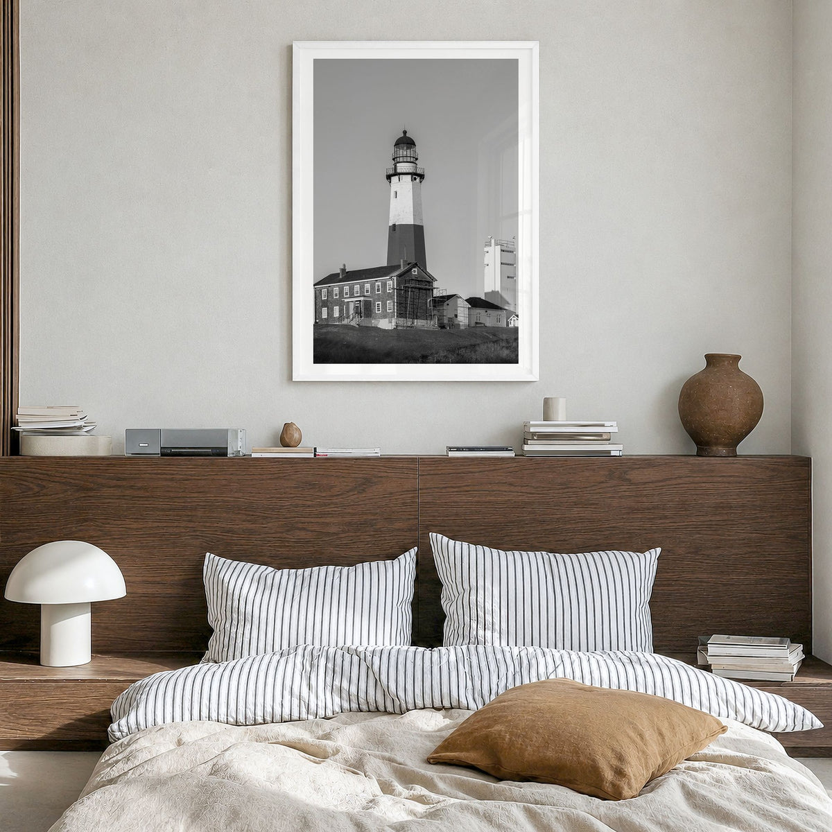 East Hampton Photo Poster in a white wood frame, hanging in a bedroom, white border