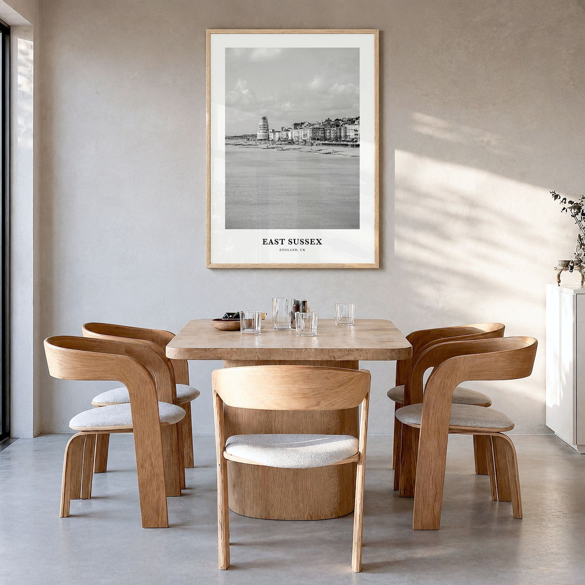 East Sussex Classic Poster in a natural wood frame, hanging in a dining room