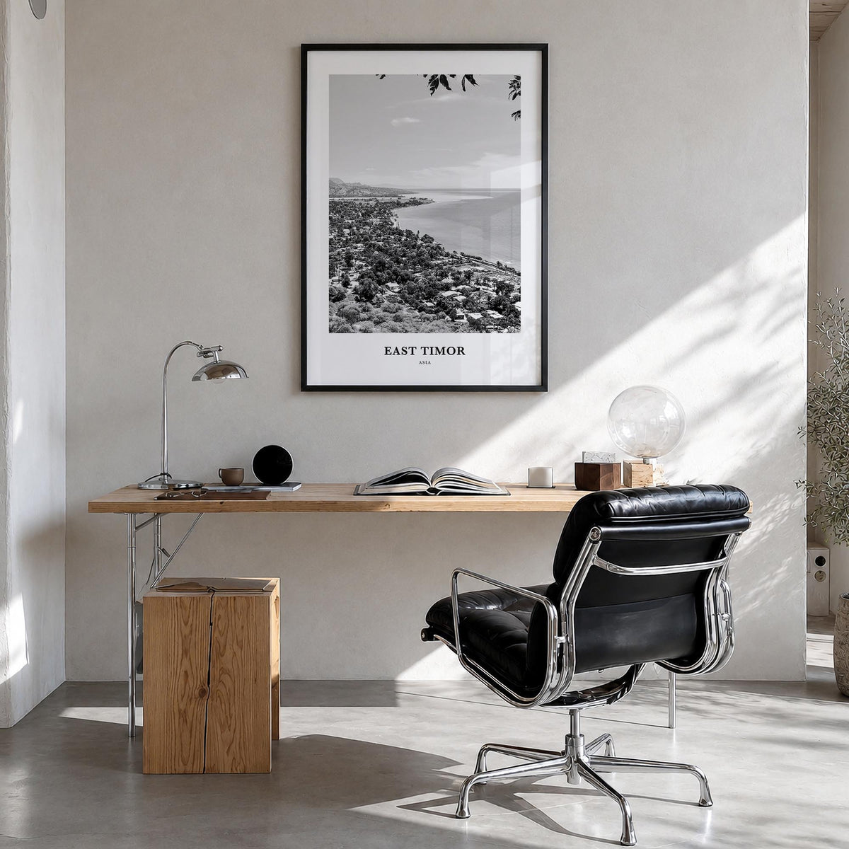 East Timor black & white classic poster of Asia – vertical wall art in black wood frame, hanging on wall